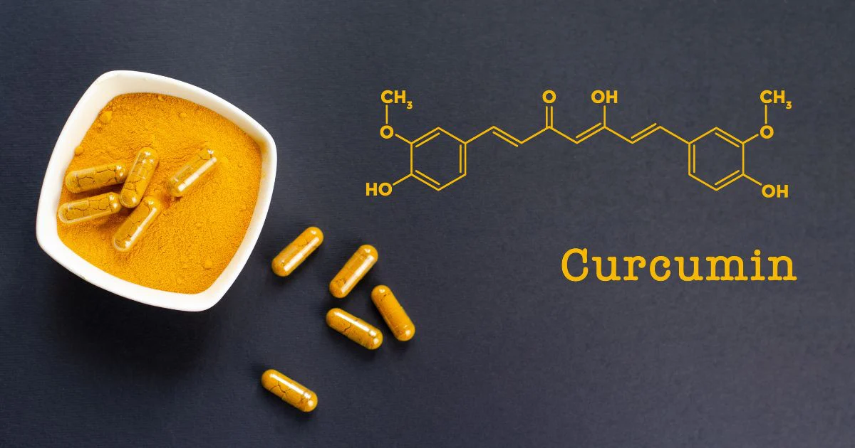 A bowl with yellow curcumin powder and capsules beside the chemical structure and name Curcumin on a dark background.
