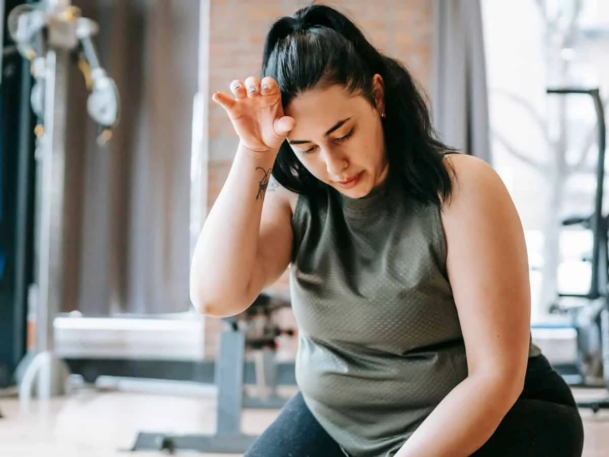 Woman suffering with IBS and Adrenal Fatigue